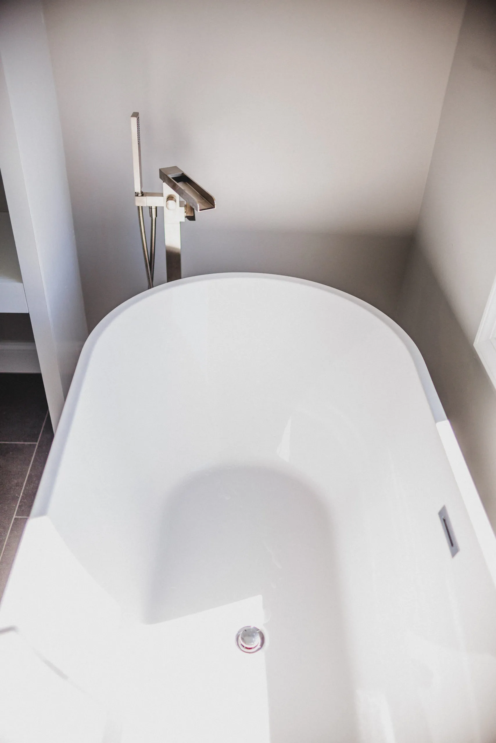 Freestanding soaking tub with tall faucet in the Falling Creek Home