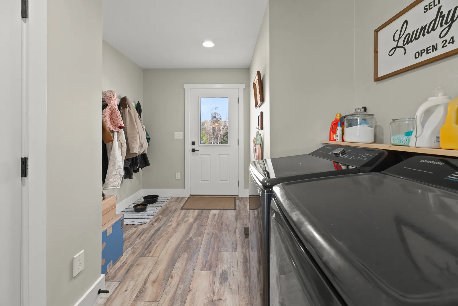 Laundry room and back entry hallway in the Carter's Mill Home