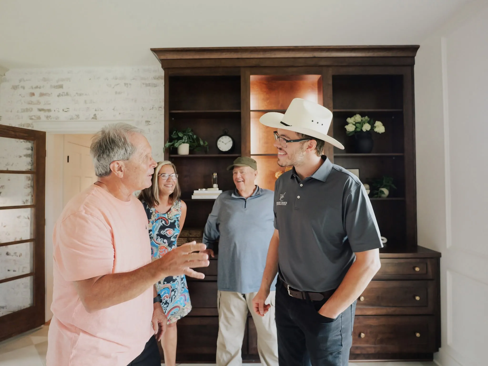 Daniel Wright talking with homeowners at an open house