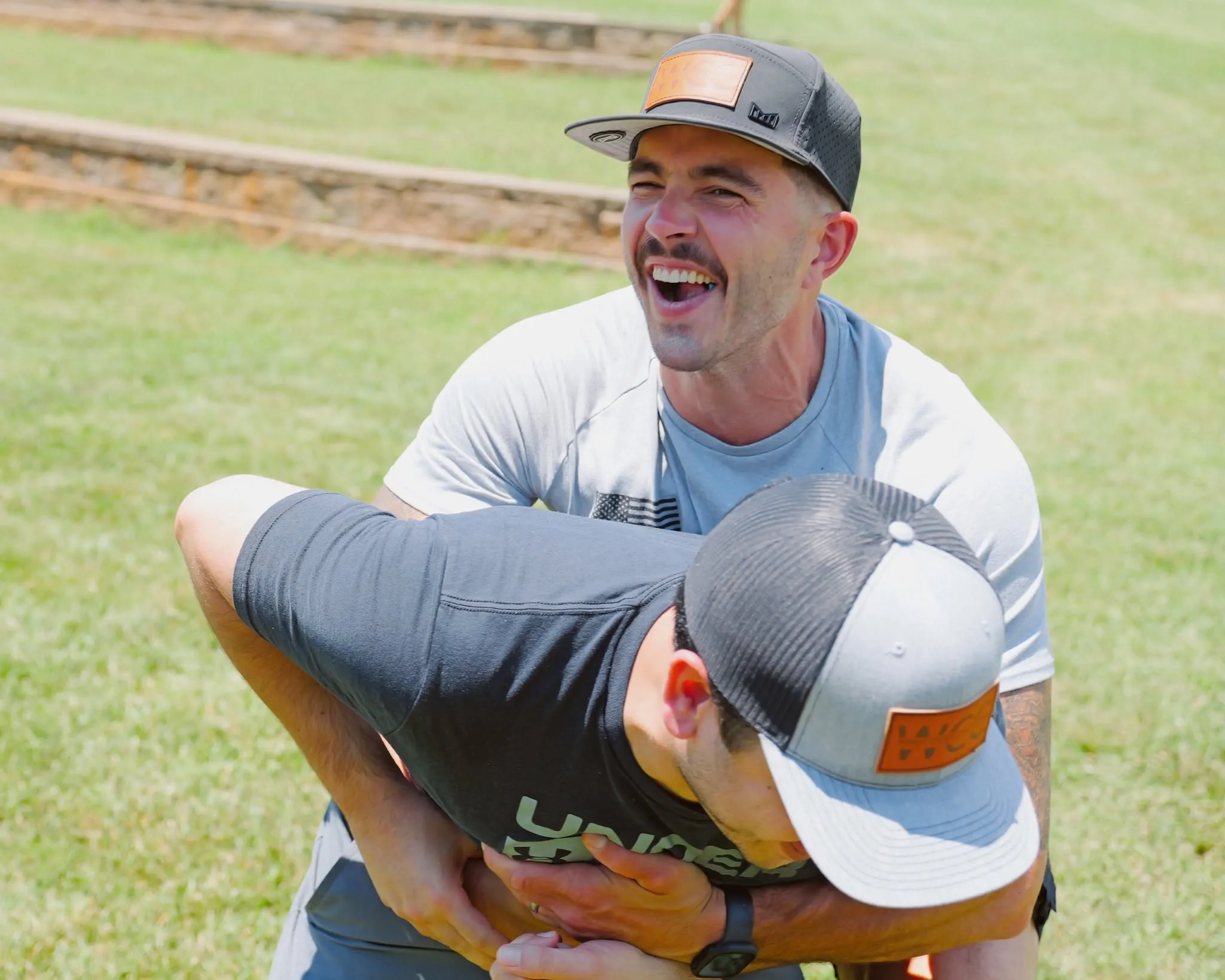 Two Wright Choice team members laughing together outdoors