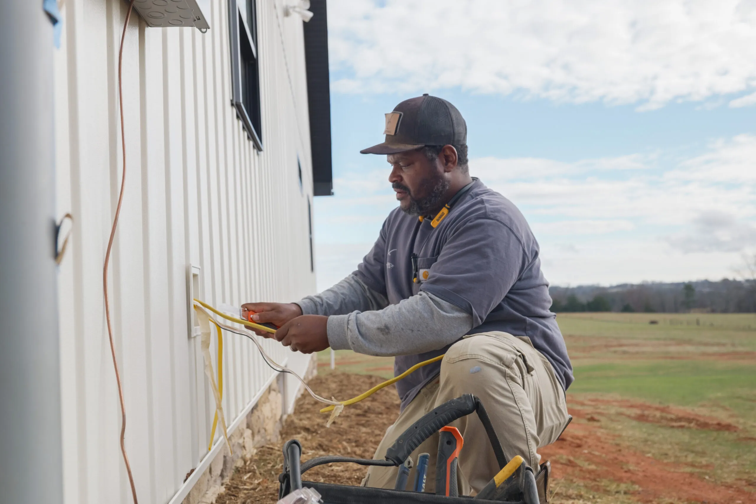Wright Choice crew member working on a jobsite exterior