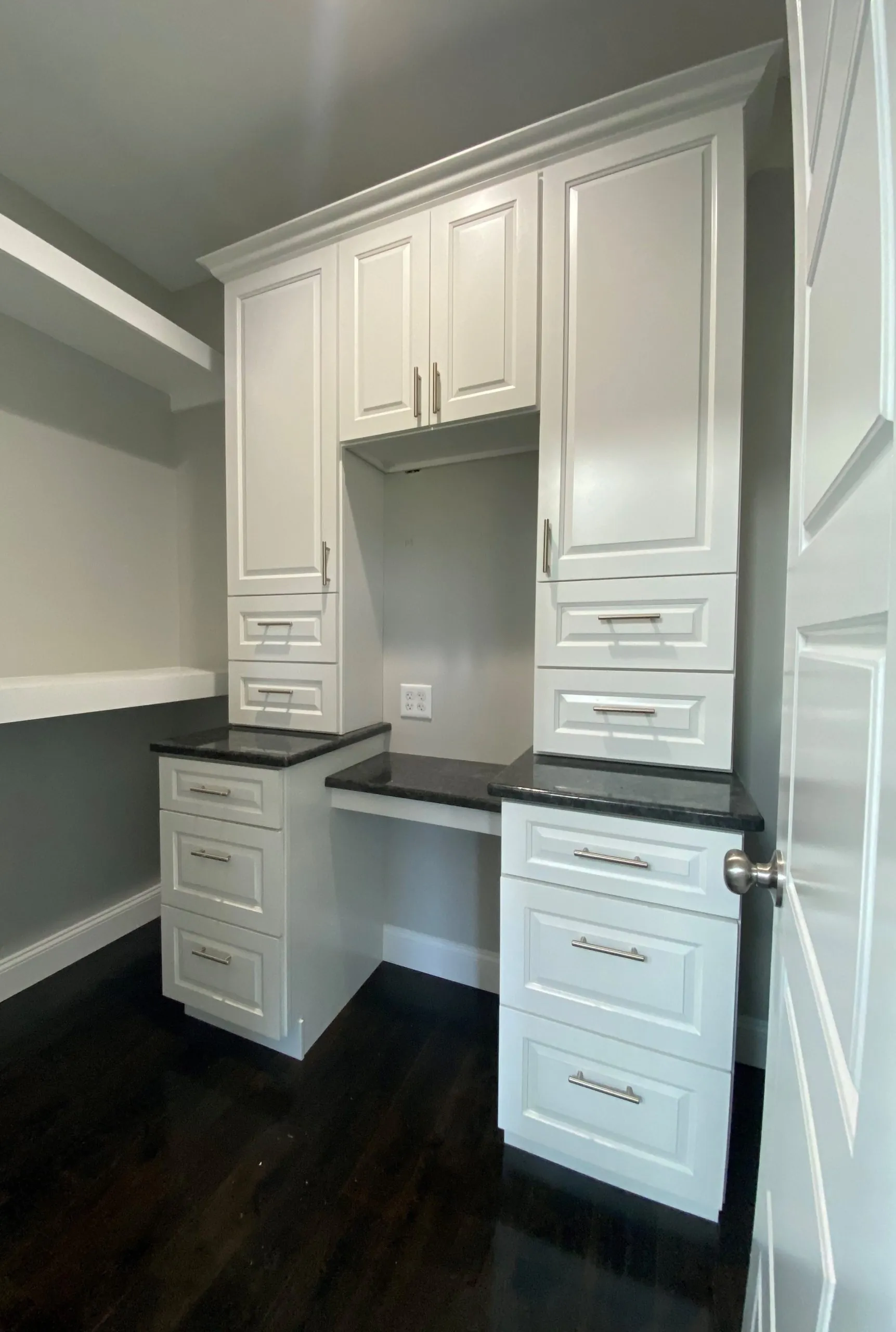 Built-in desk and white cabinets in the Falling Creek Home