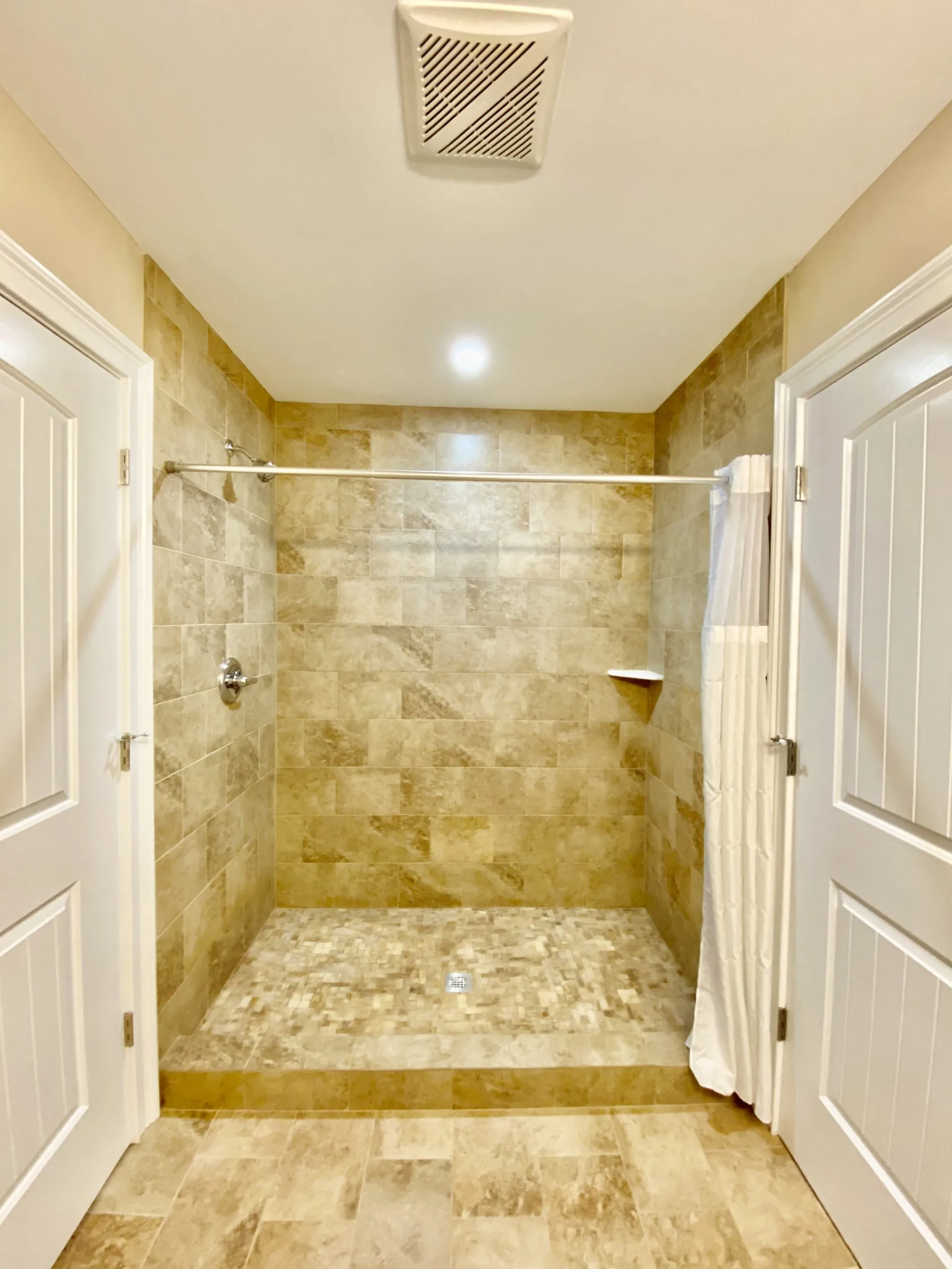 Walk-in tiled shower in the Forest Home